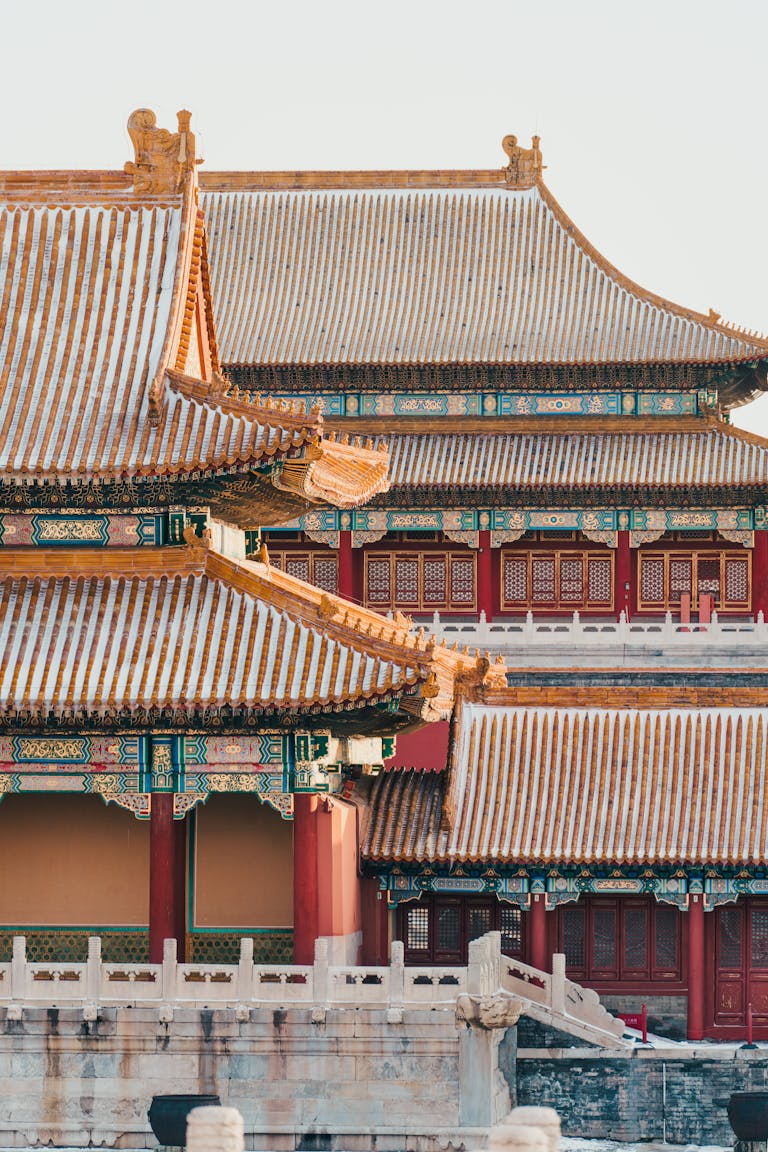 A beautifully detailed view of traditional Chinese architecture, highlighting the ornate roofs and vibrant colors.